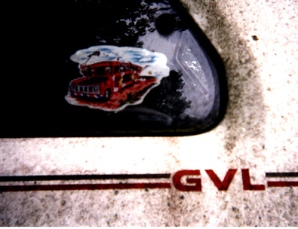 The Grateful Dead sticker on Yugo's rear window