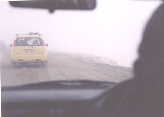 the road in thhrough the clouds